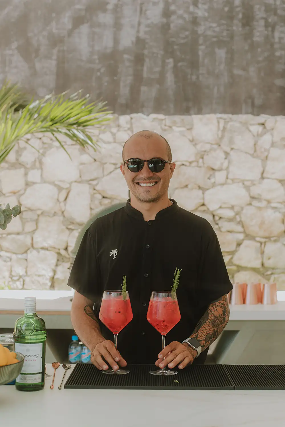 Private bartender crafting cocktails at a villa